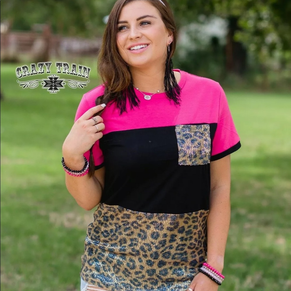 Crazy Train (Brand New) top. Cheetah, black and gold colors. In a size medium.